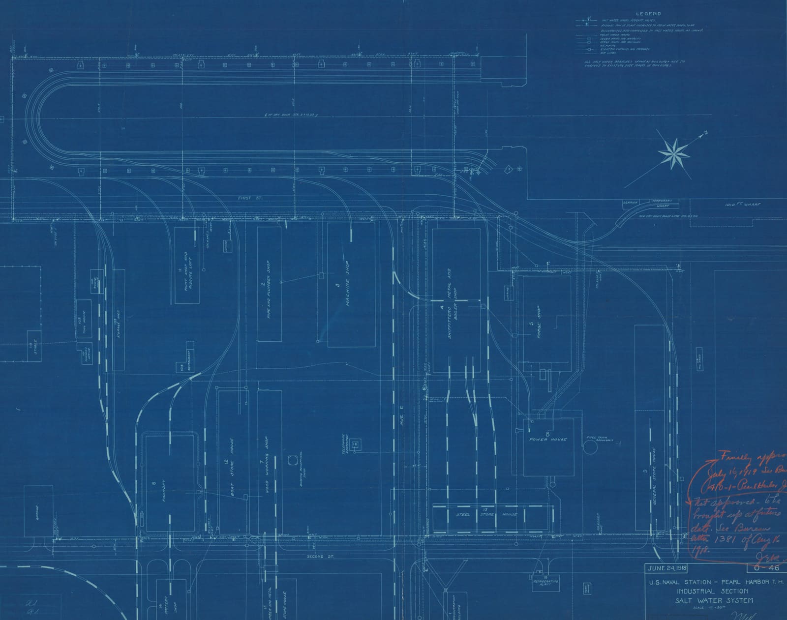 Structural drawings and plans on a desk